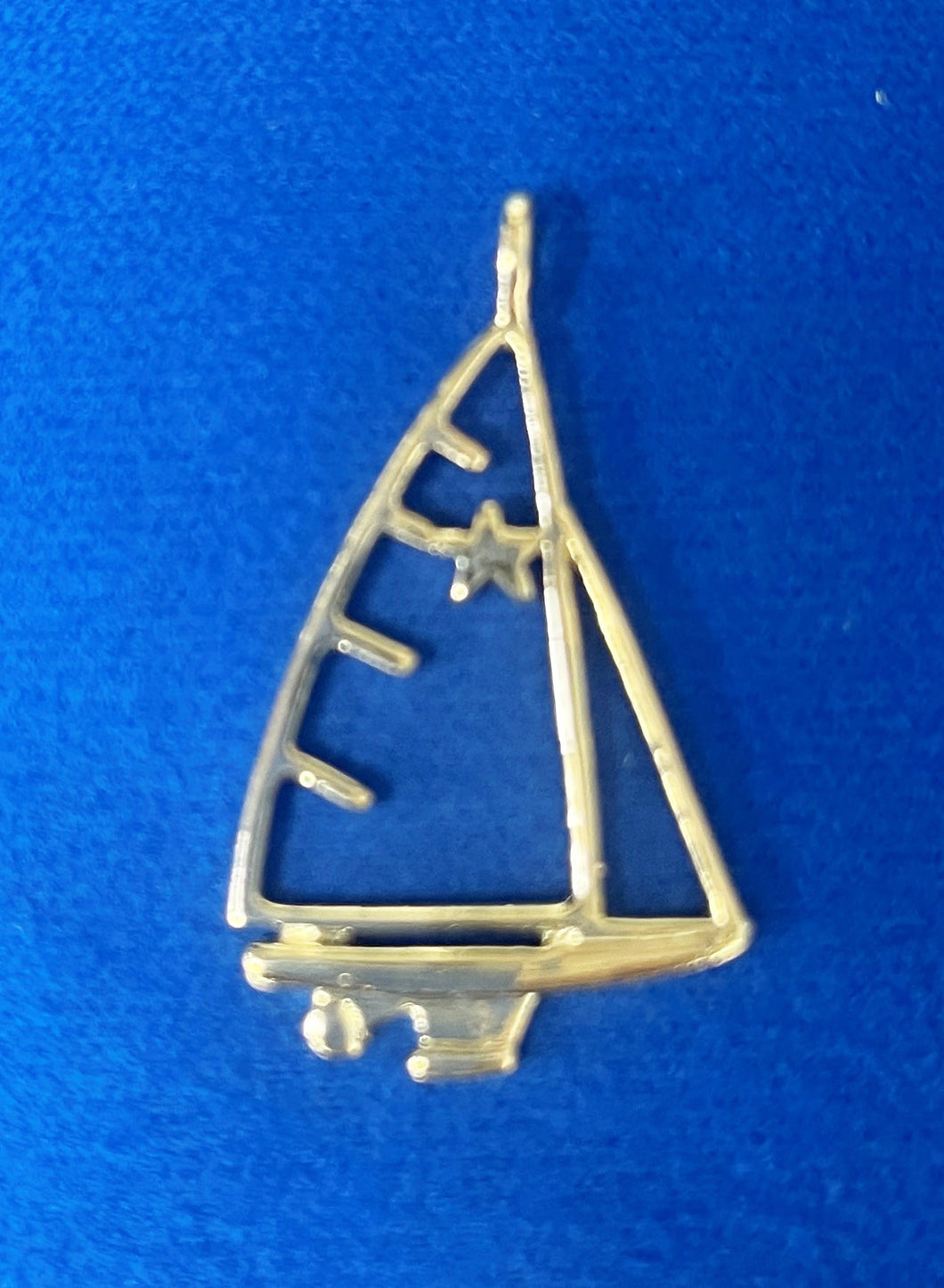 Star 14k gold boat pendant